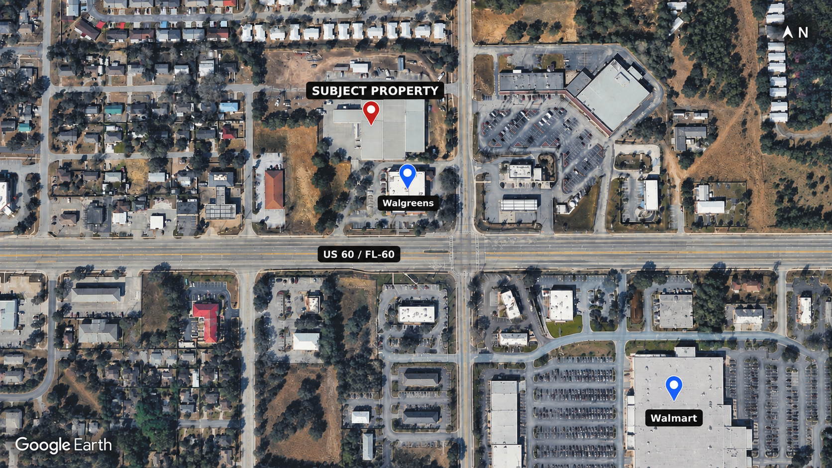 Aerial showing the subject property, US-60, Walgreens, and Walmart